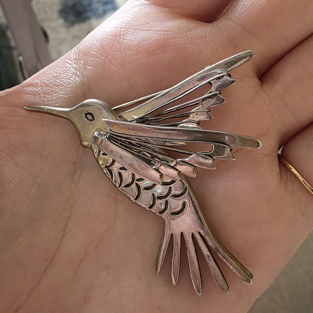 Silver Hummingbird Brooch with Intricate Details